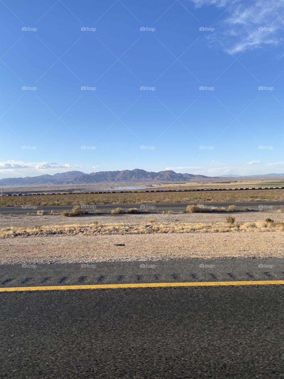 Freight Train off in the distance in Daggett California 
