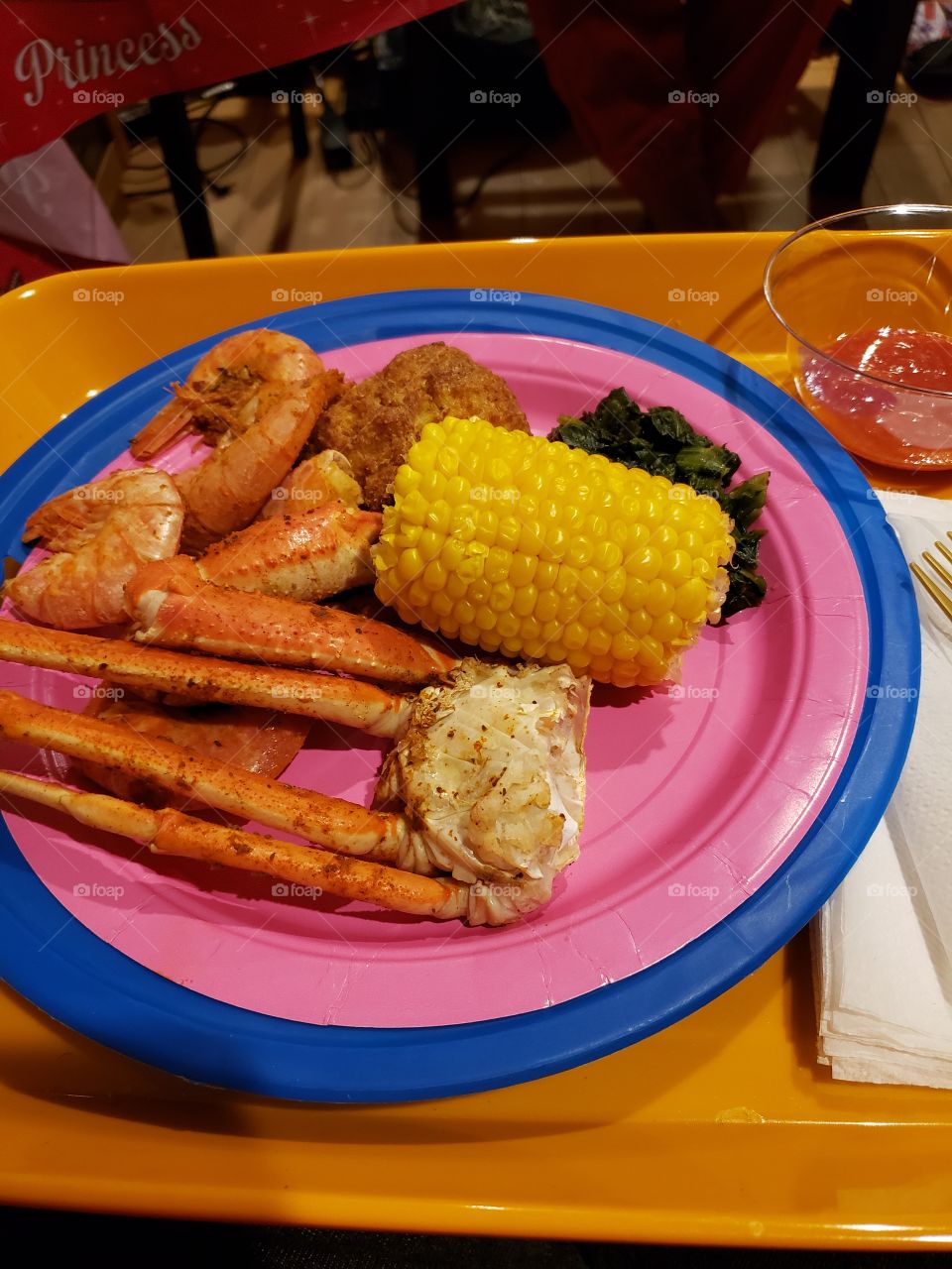 Alaskan king crab legs steamed shrimp corn spinach cocktail sauce