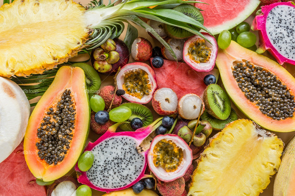 Flat lay of fresh exotic fruits 