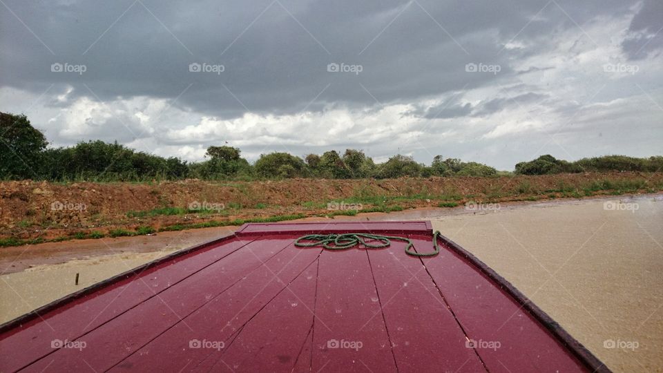 raining and Boat. raining and Boat, alone at Tonle Sap Cambodia,  20 June 2015