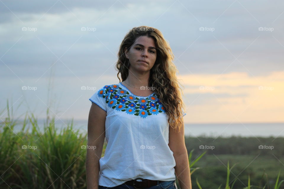 Woman with beautiful background and sunset