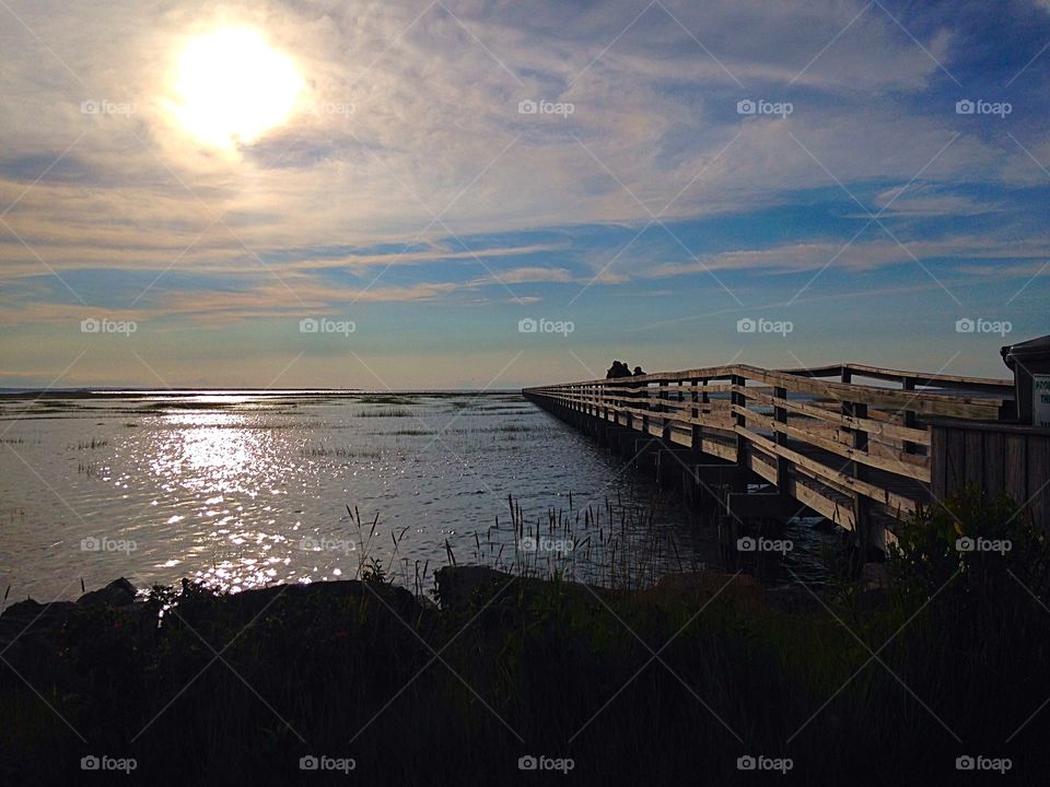 The hour before sunset. Boardwalk in the golden hour - golden hour mission