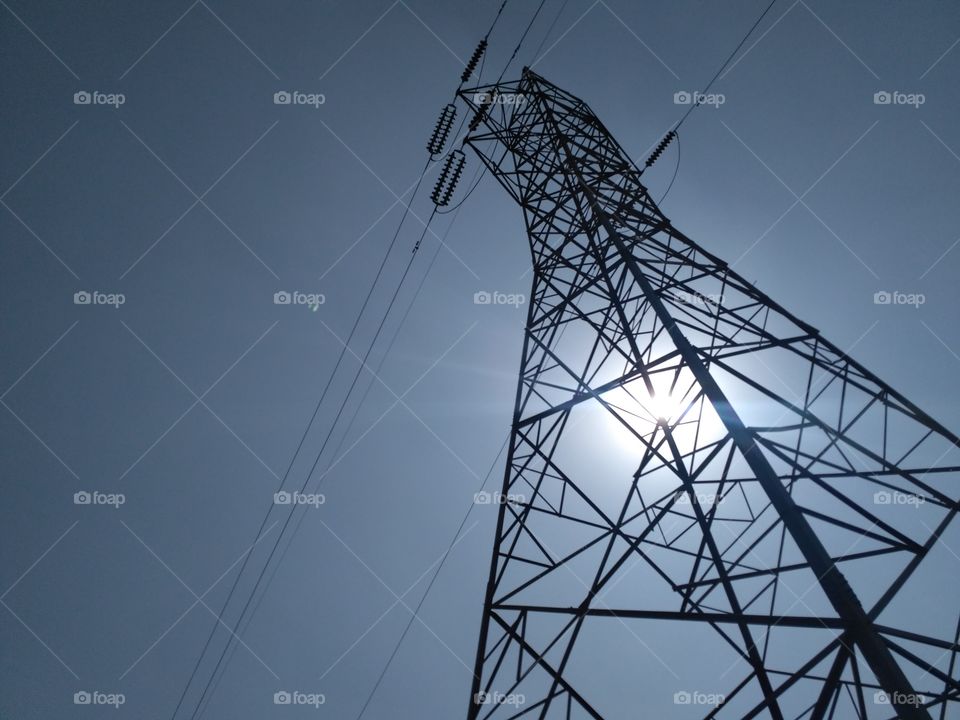 Electrical Transmission Poles / Transmission Lines / Electricity Poles / Power Poles / Sunlight / Solar Energy and Electrical Energy / High Voltage / Sunny / Randomly clicked picture