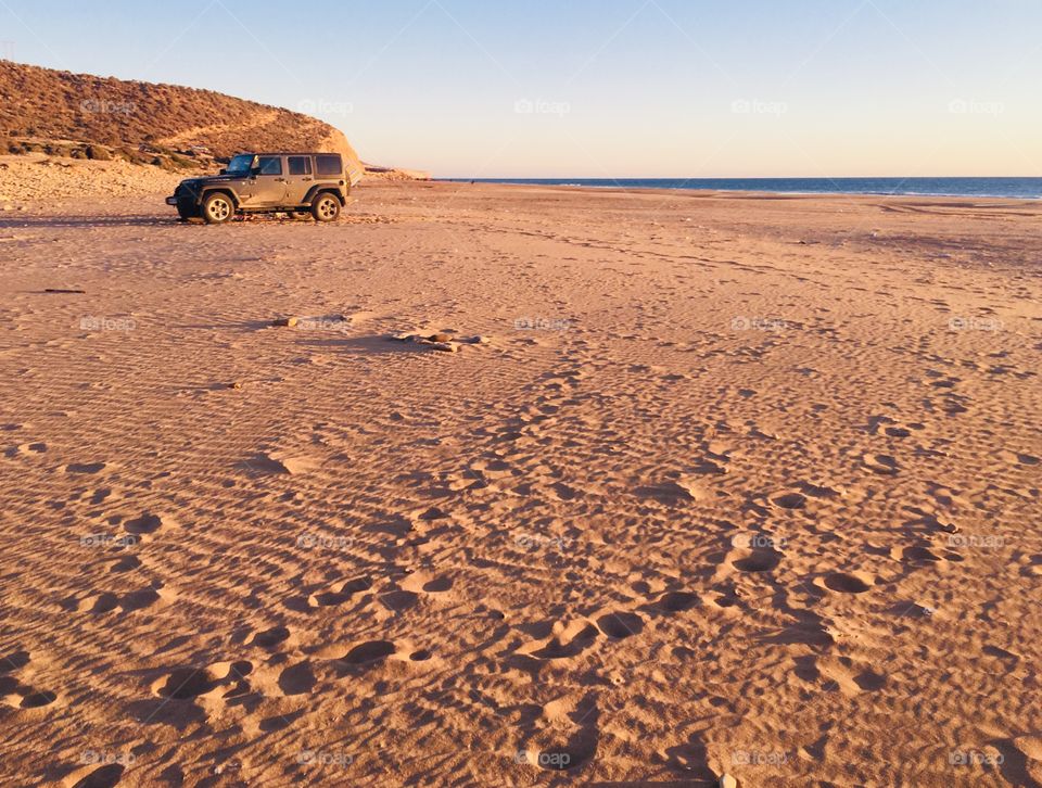 Jeep  in beach 