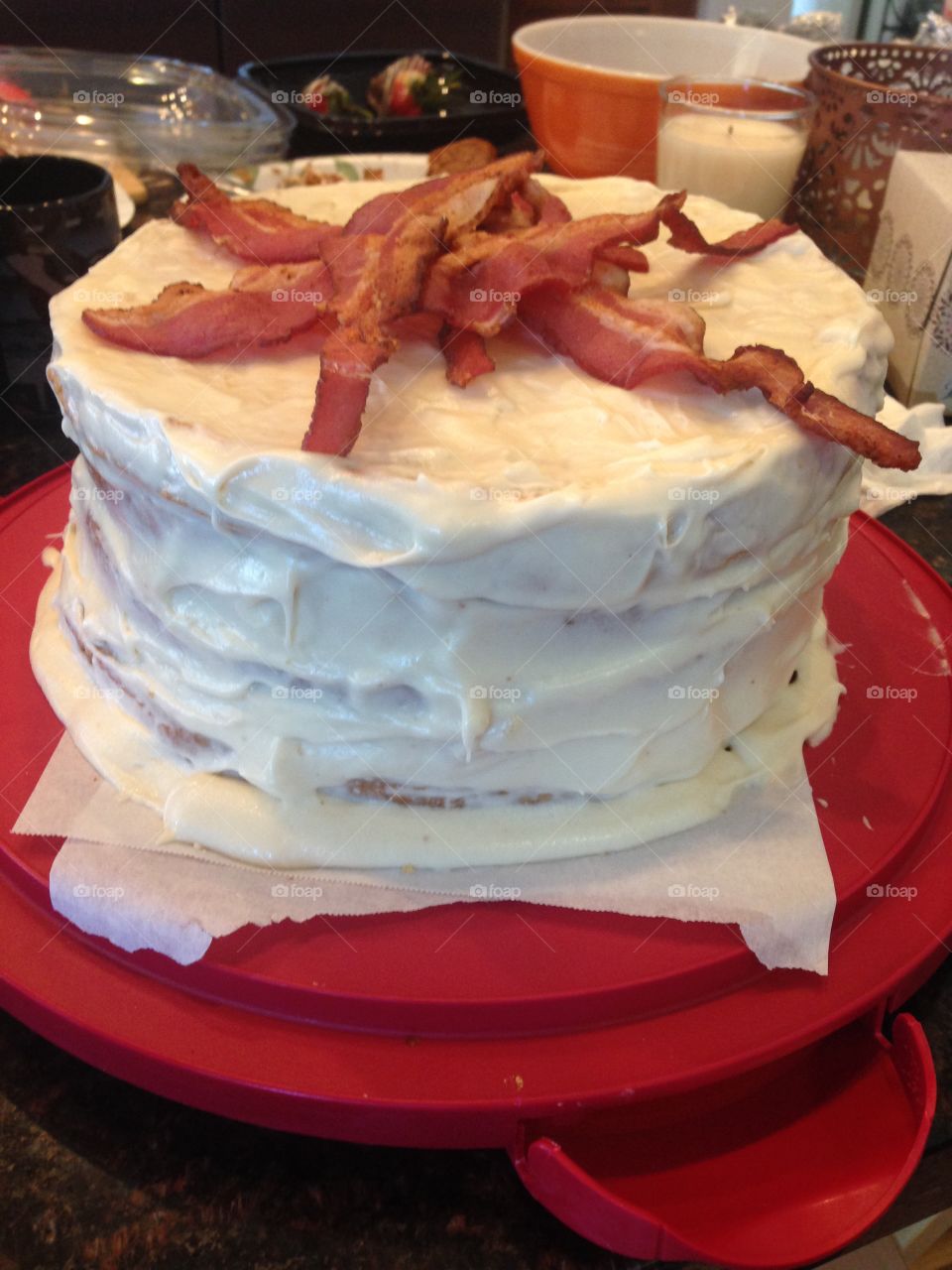 Bacon cake . Yes that's a bacon cake. Maple flavored caked. Sweet buttercream frosting and bacon. 