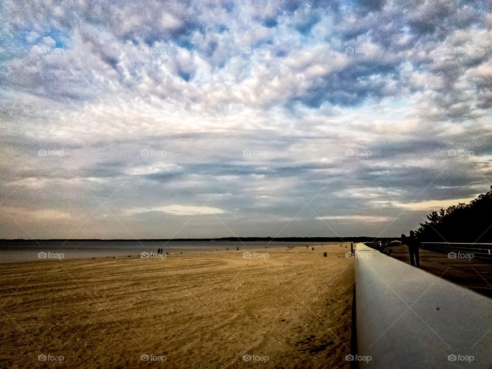 New York, Long Island, Kings Park, Sunken Meadow State Park, sidewalk, sand, water, beach, clouds, nature, wind, waves, people walking, calm, relaxation, peaceful, sunset, summer, panoramic view, warm, colors,