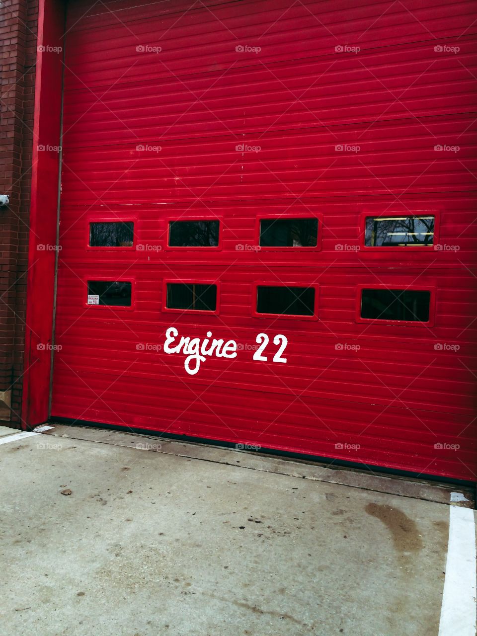 Front of Chicago fire station garage with words Engine 22 on front 