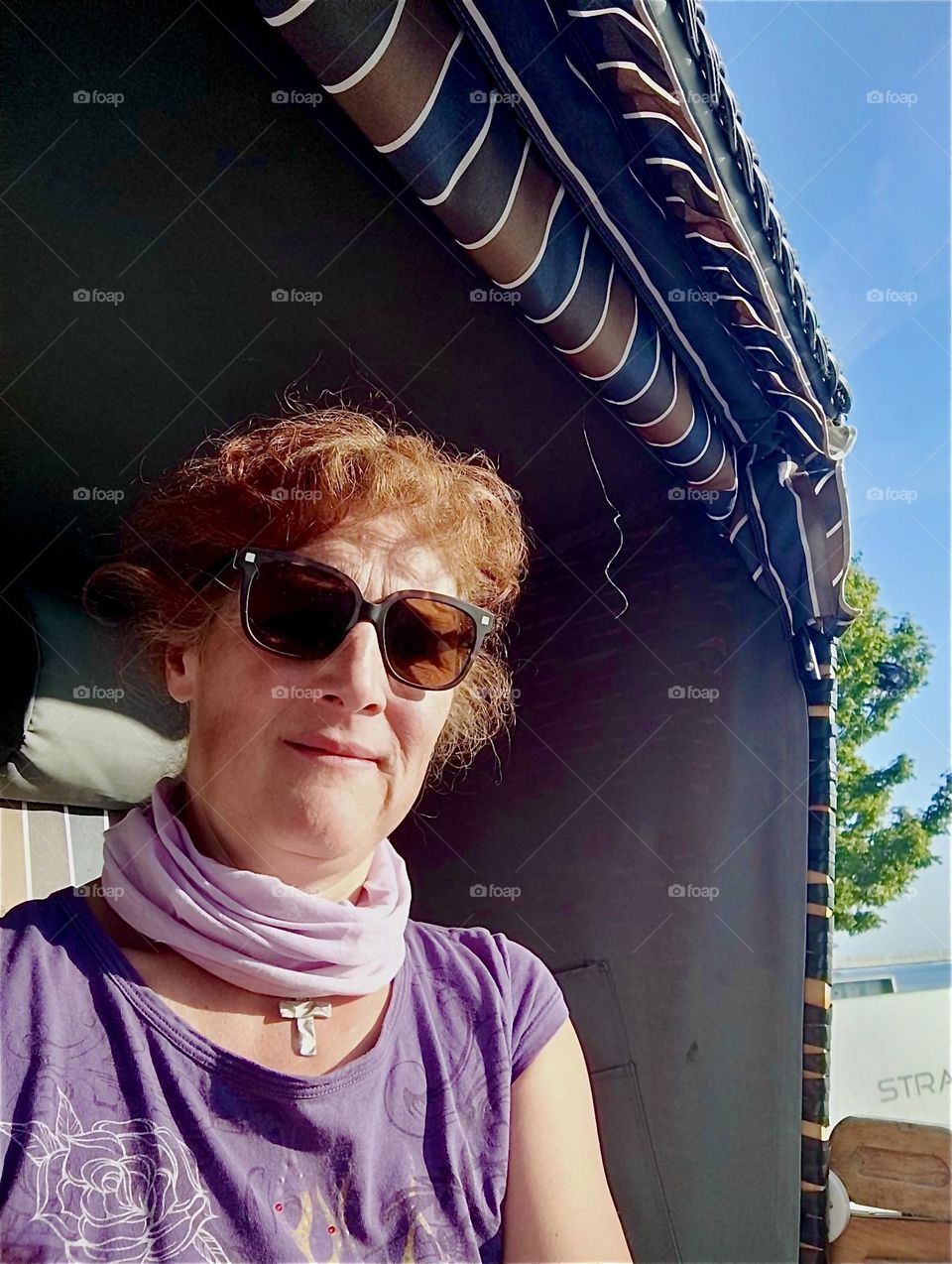 Today our globetrotting lady is basking in the afternoon sun wearing her cool shades sitting in a beach basket in “Dranske” on the island “Rügen” in the “Baltic Sea” or “Ostsee” in “Western Pomerania”, Germany. 2024. Hypnotic Productions