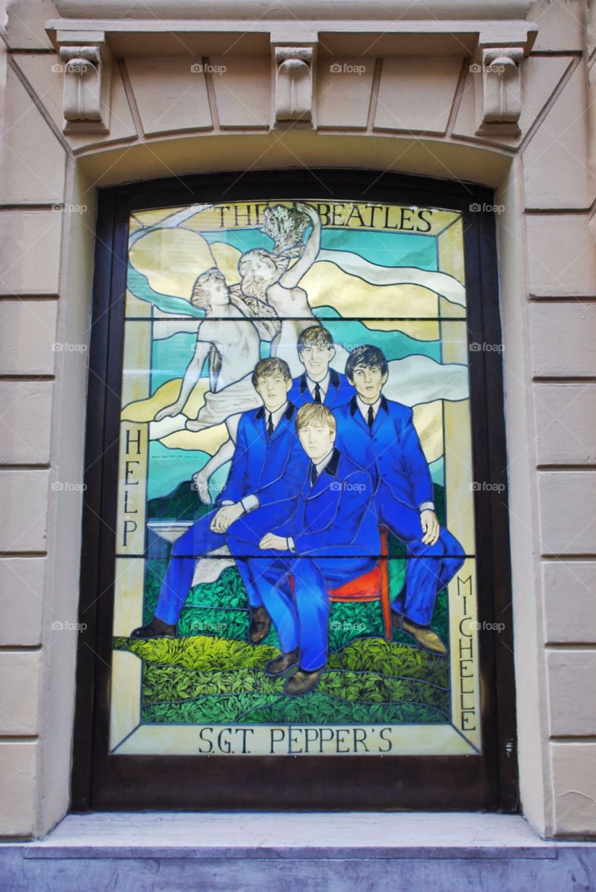 Stained glass window  Beatles. Stained glass window of the early Beatles for the Rock and Roll Cafe on the exclusive Via Veneto in Rome, Italy