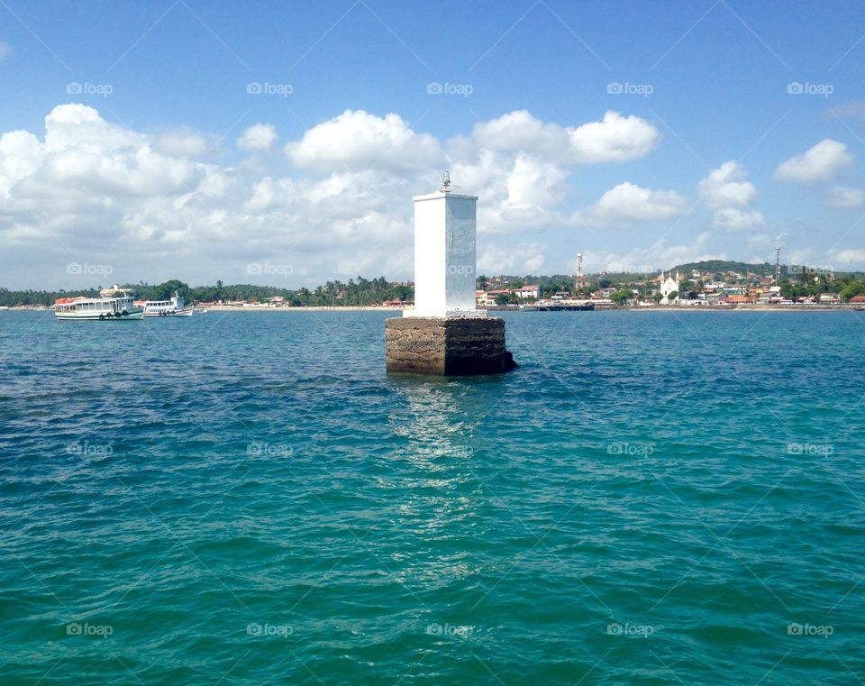 lighthouse on the beach of Mar Grande, in Vera Cruz, Ilha Itaparica, Bahia, Brazil