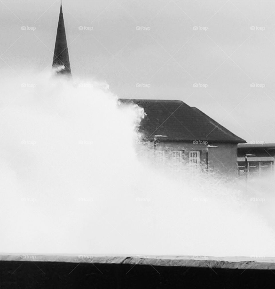 Black and white crashing wave