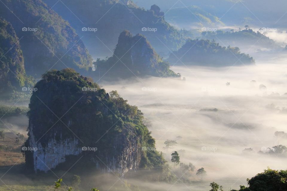 Scenic view of mountain in misty morning