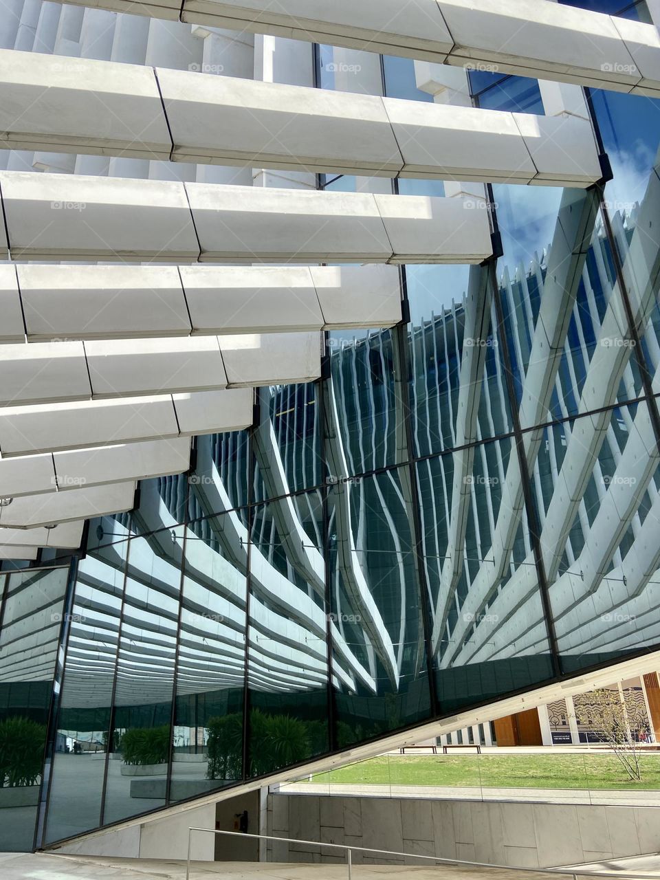 Reflection of modern building in glass 