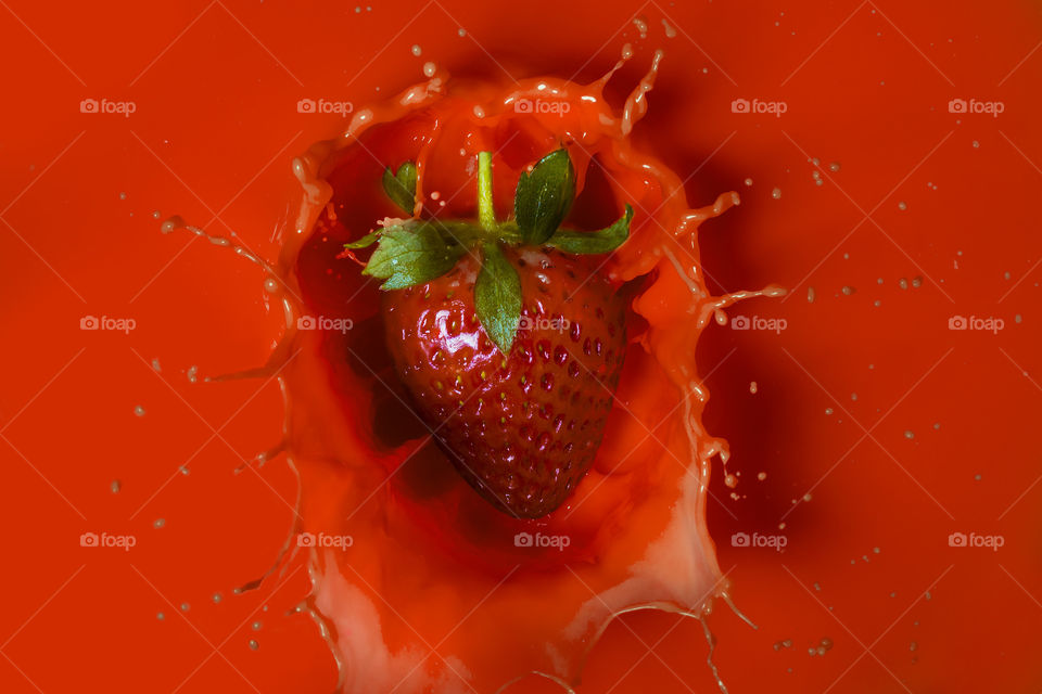 Strawberry on red