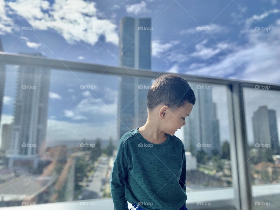 He is not scared of heights and he is loving the view from the top. Good job little man:)