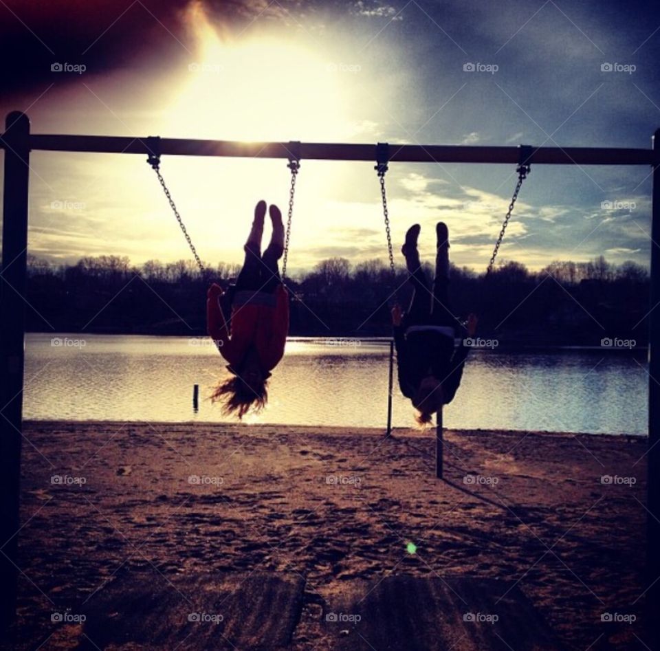 Girls swinging 