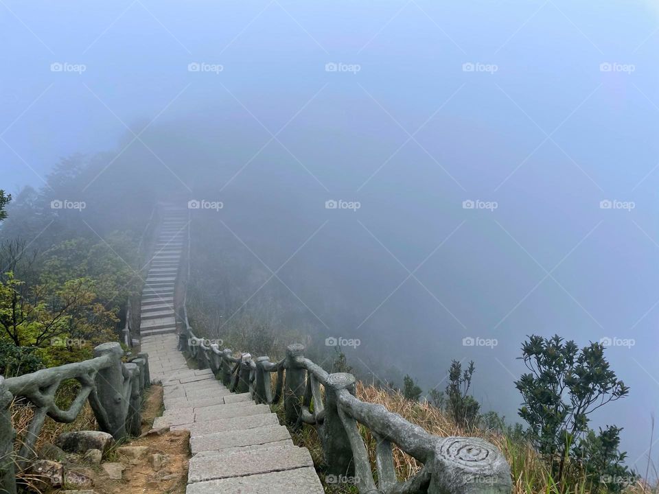 surrounded by clouds