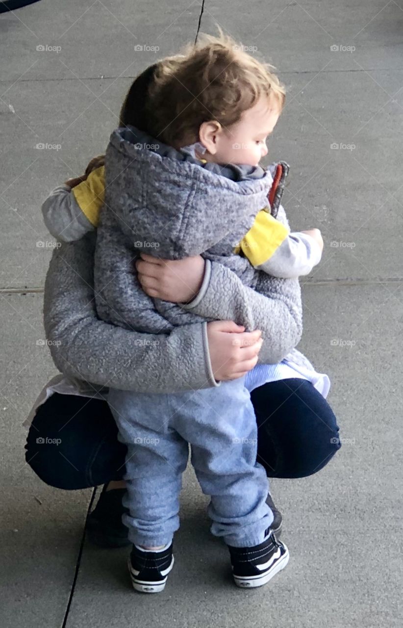 Brother and sister hug