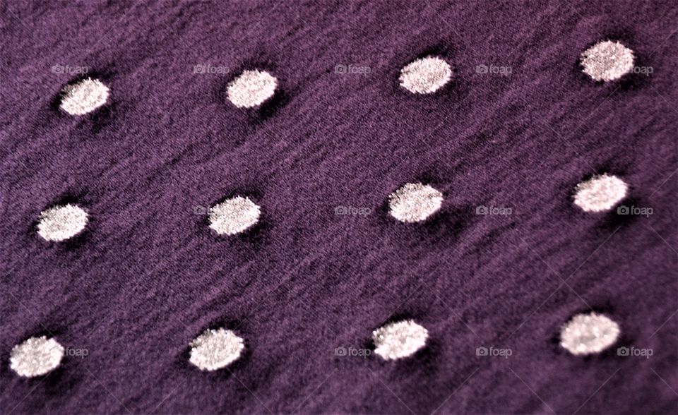 Purple fabric with polka dots 