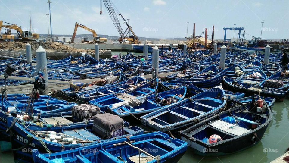 Beautiful blue boats in harbour at essaouira city in Morocco.