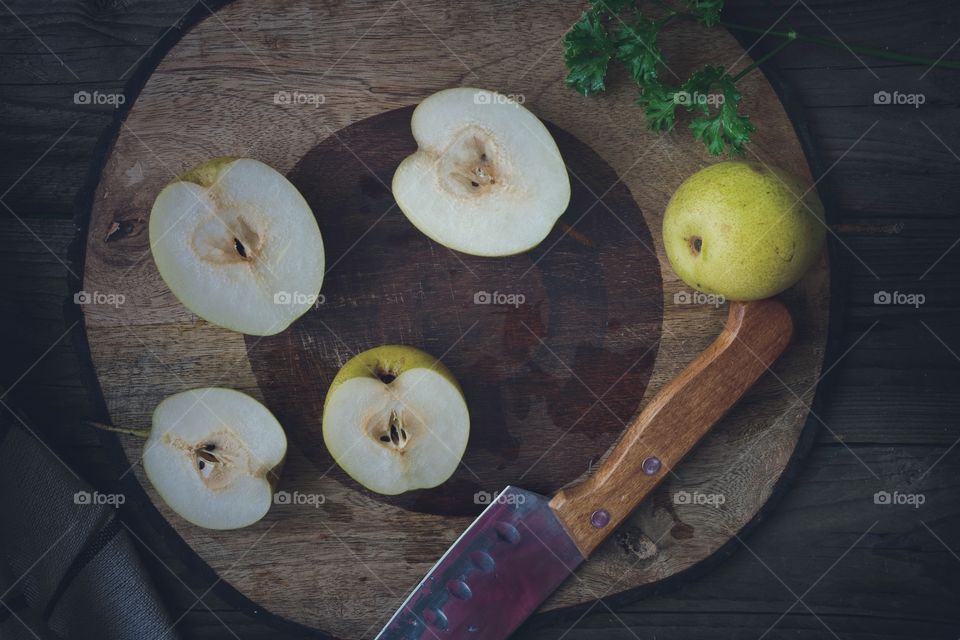 pears placed on a cutting board