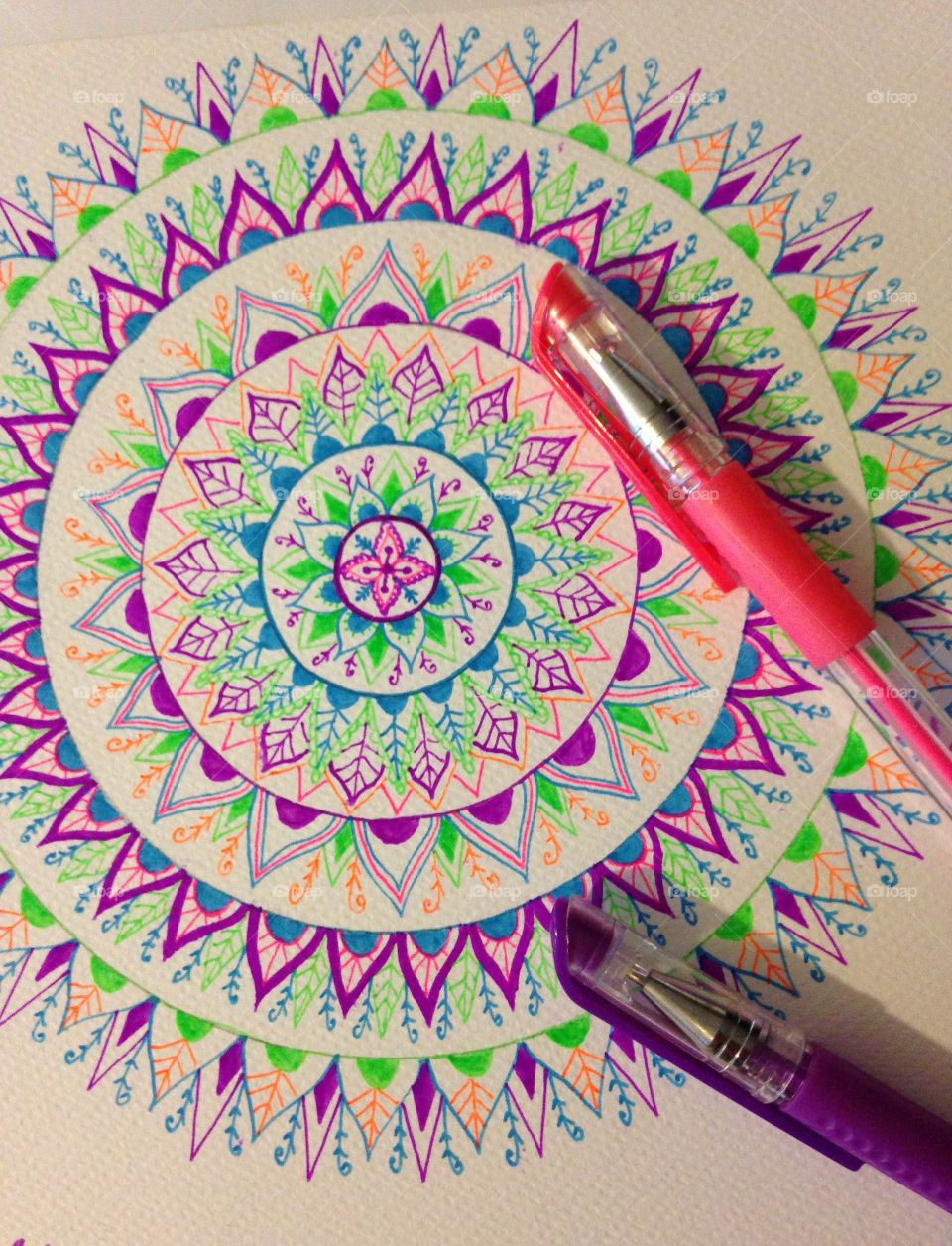 Mandala with greetings and pen 