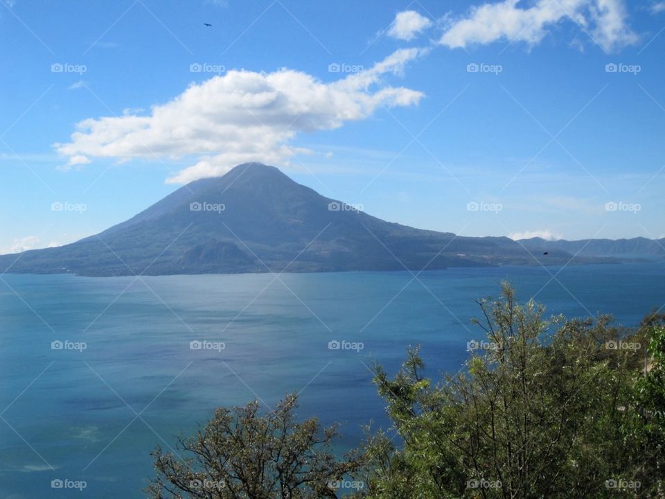 Scenic view of lake atitlan and mountain