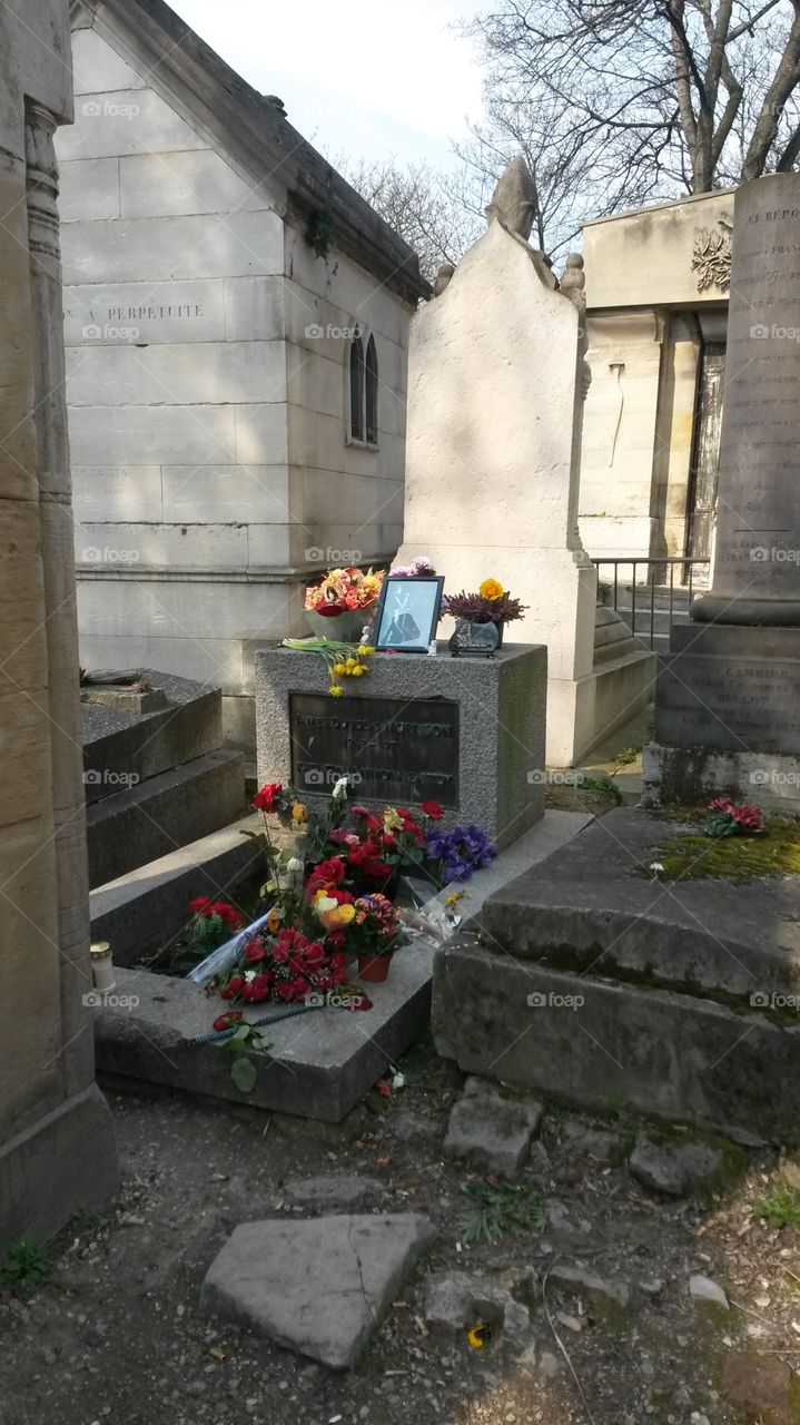 Jim Morrison's Grave. Grave of the lead singer for The Doors at Petre Lachaise cemetery  in Paris