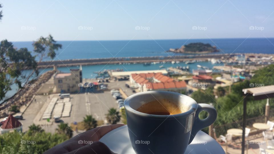 a morning coffee overlooking a sea view