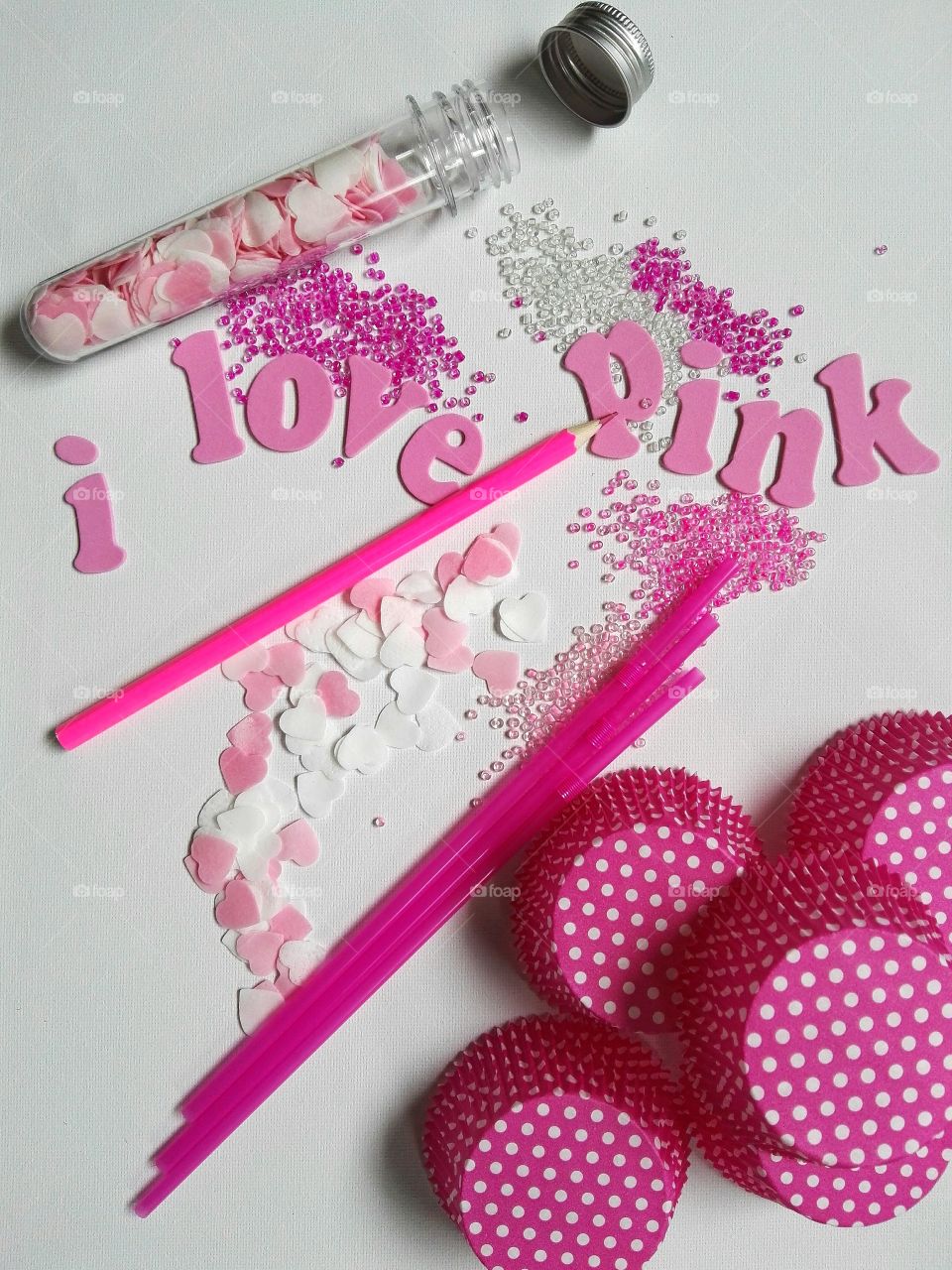 Love text made with pink paper