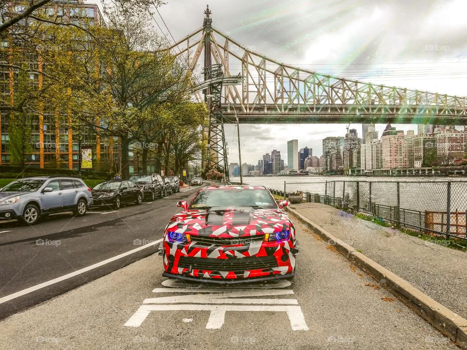Multicolor car under the bridge 