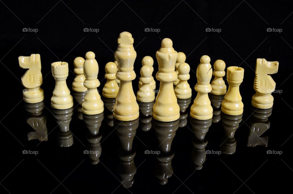 Chess Pieces in Black Background