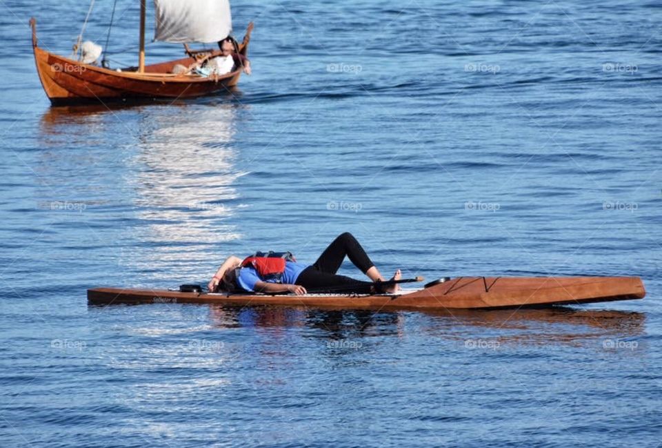 Relaxing on a paddle board