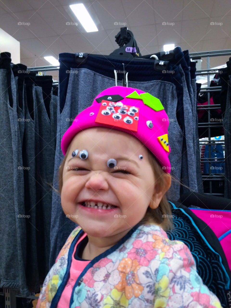 Googly Eyes. Peeled googly eyes off of hat she decorated and stuck them to her face!