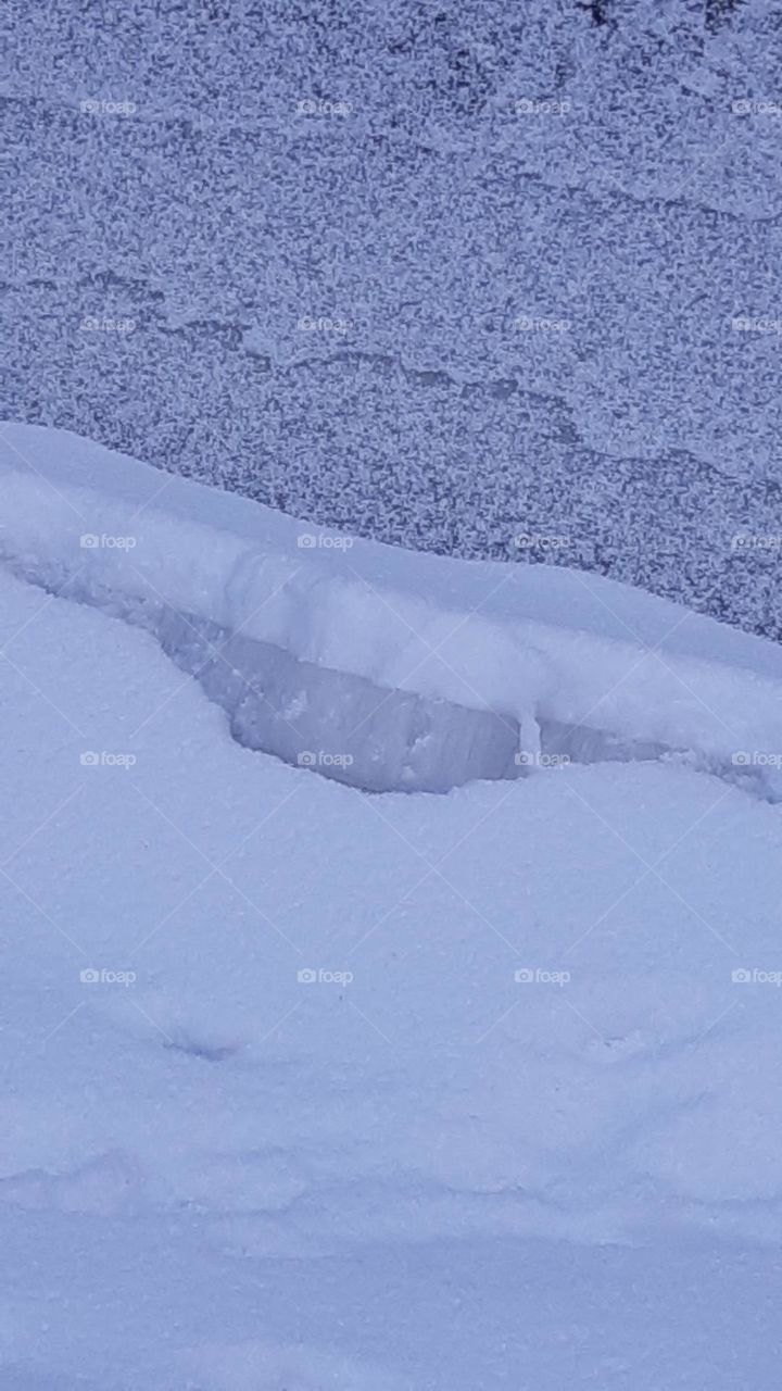 winter picture paint by frost on the lake, the thick ice cracks and freezes again, and maps are delicately drawn