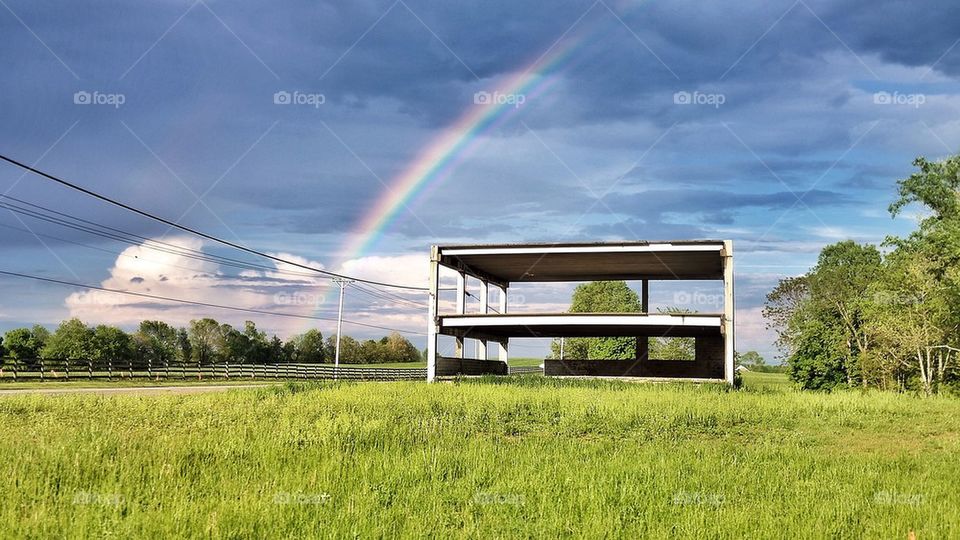 Rainbow over ruins