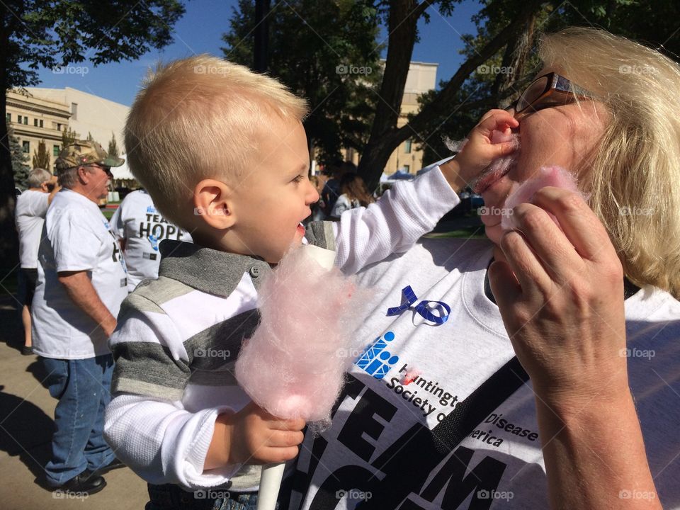 Baby and Grandma play with cotton candy