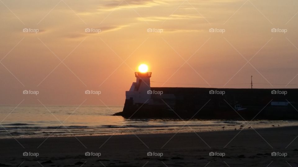 lighthouse sunrise