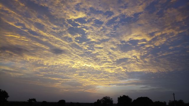 BBB.One fine evening Golden colour clouds sky nature's are.. osm.