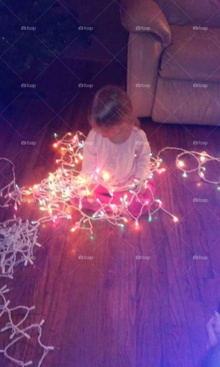 Girl playing with lights
