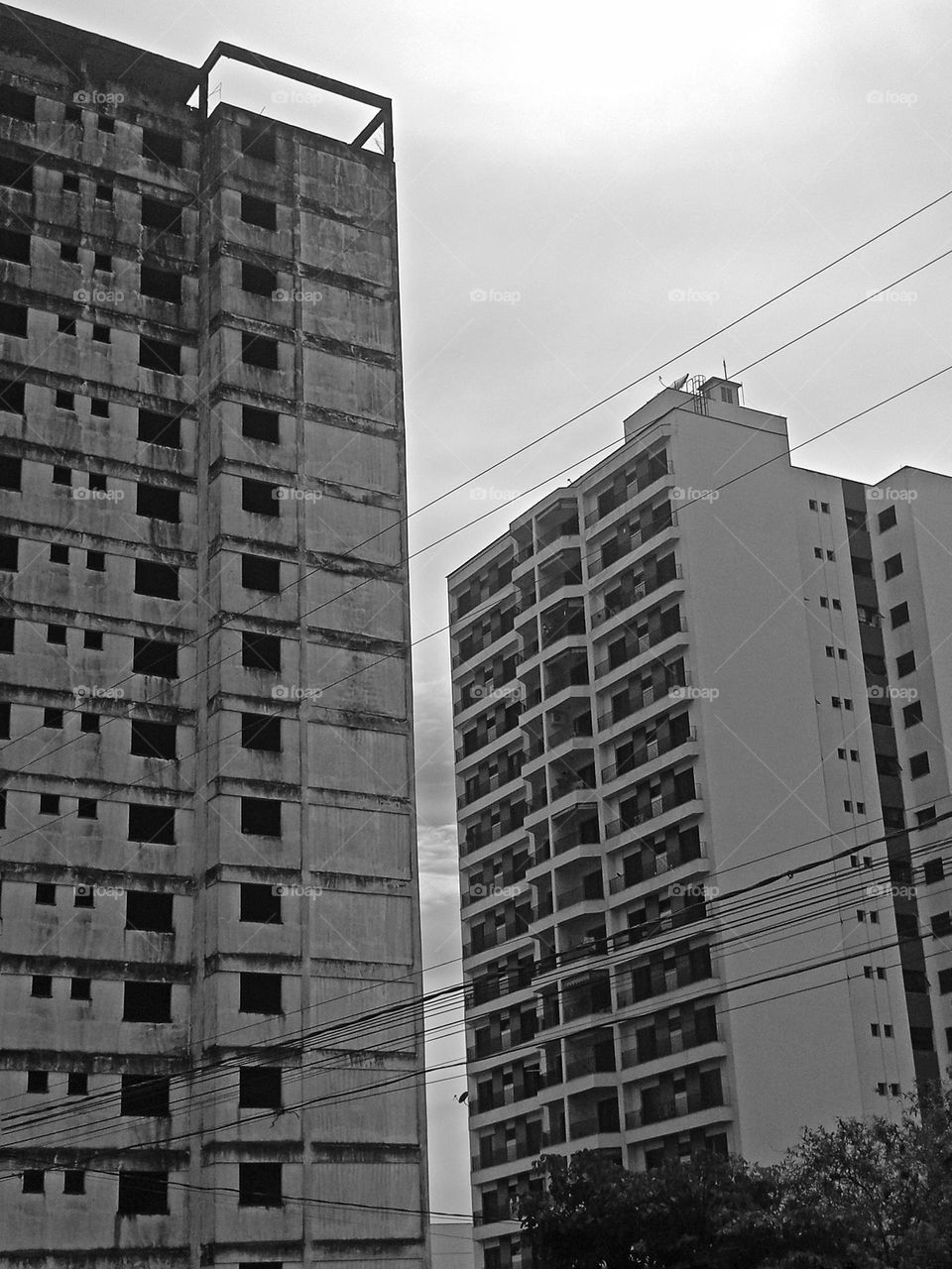 old abandoned building near a new residential building