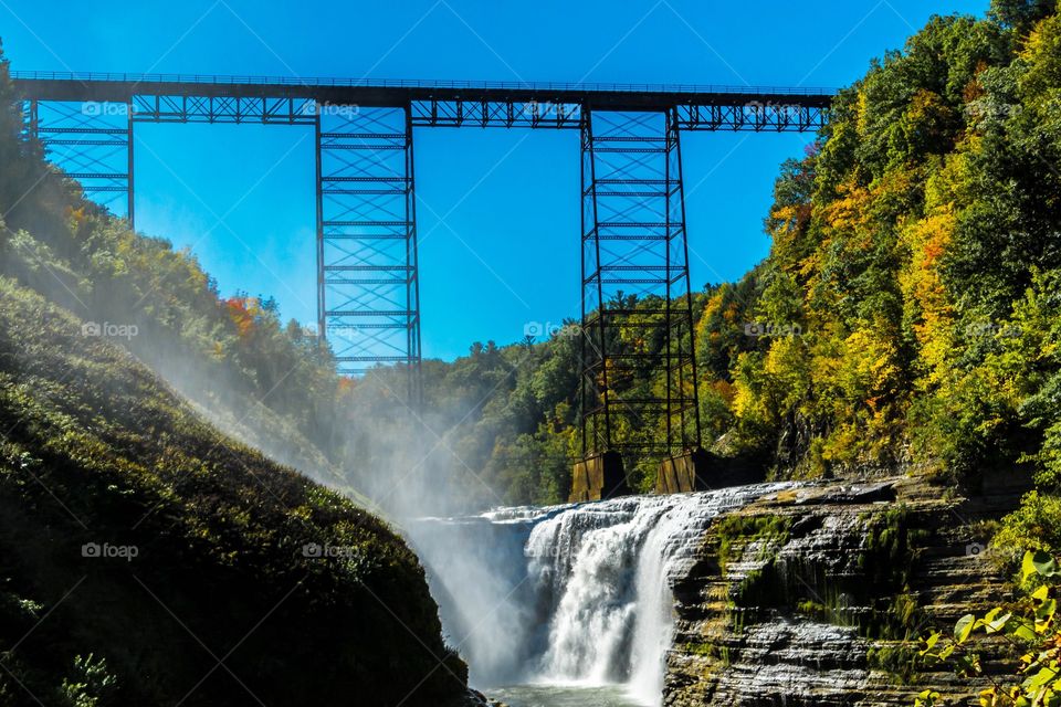 Bridge over waterfall