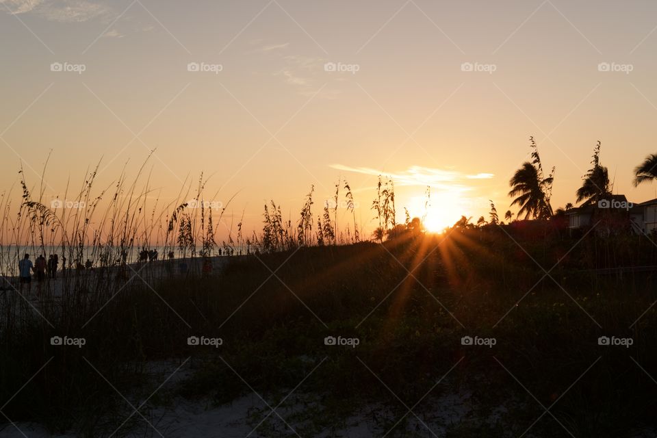 Sunset behind the dunes