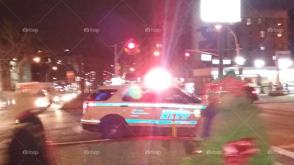 cop car at night in the city