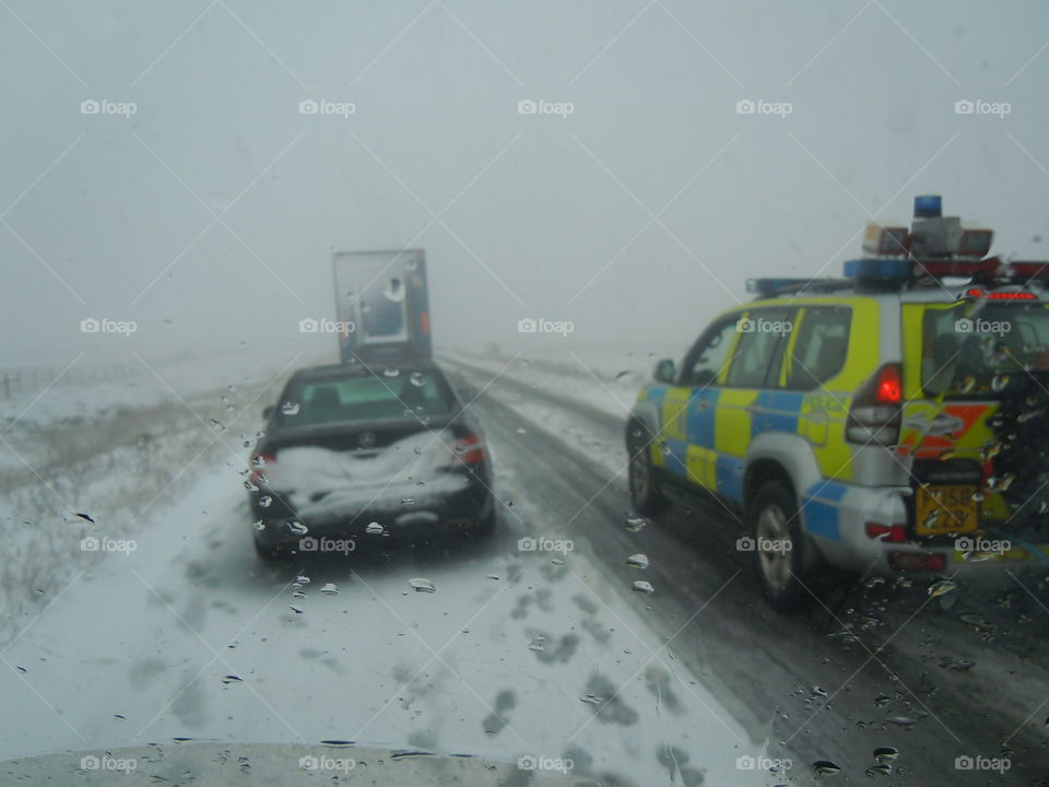 Police to the rescue. Derbyshire police towing stranded trucks off the snake pass