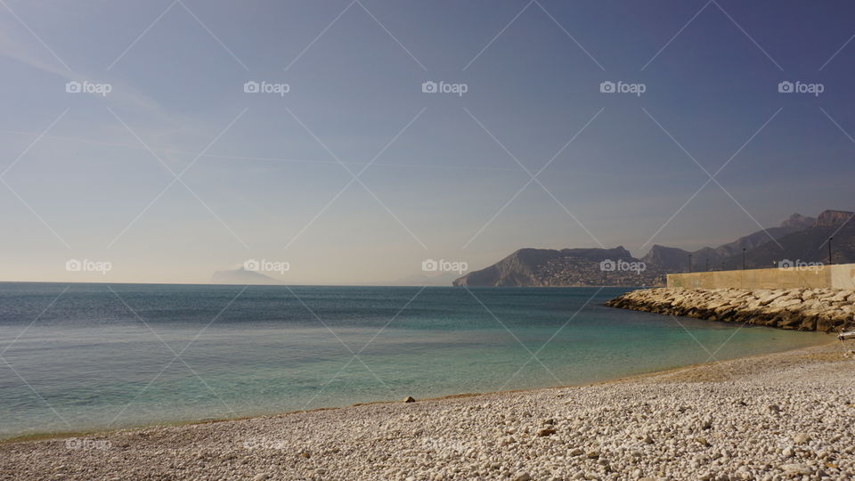 Beach#sea#mountain#sky#sun#travel