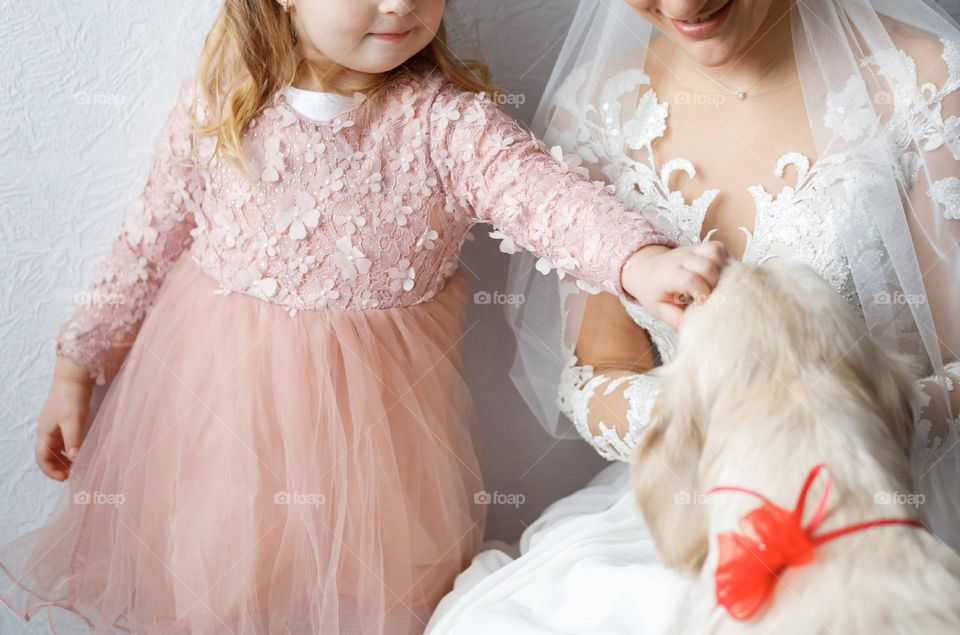 A pink dress on a little girl