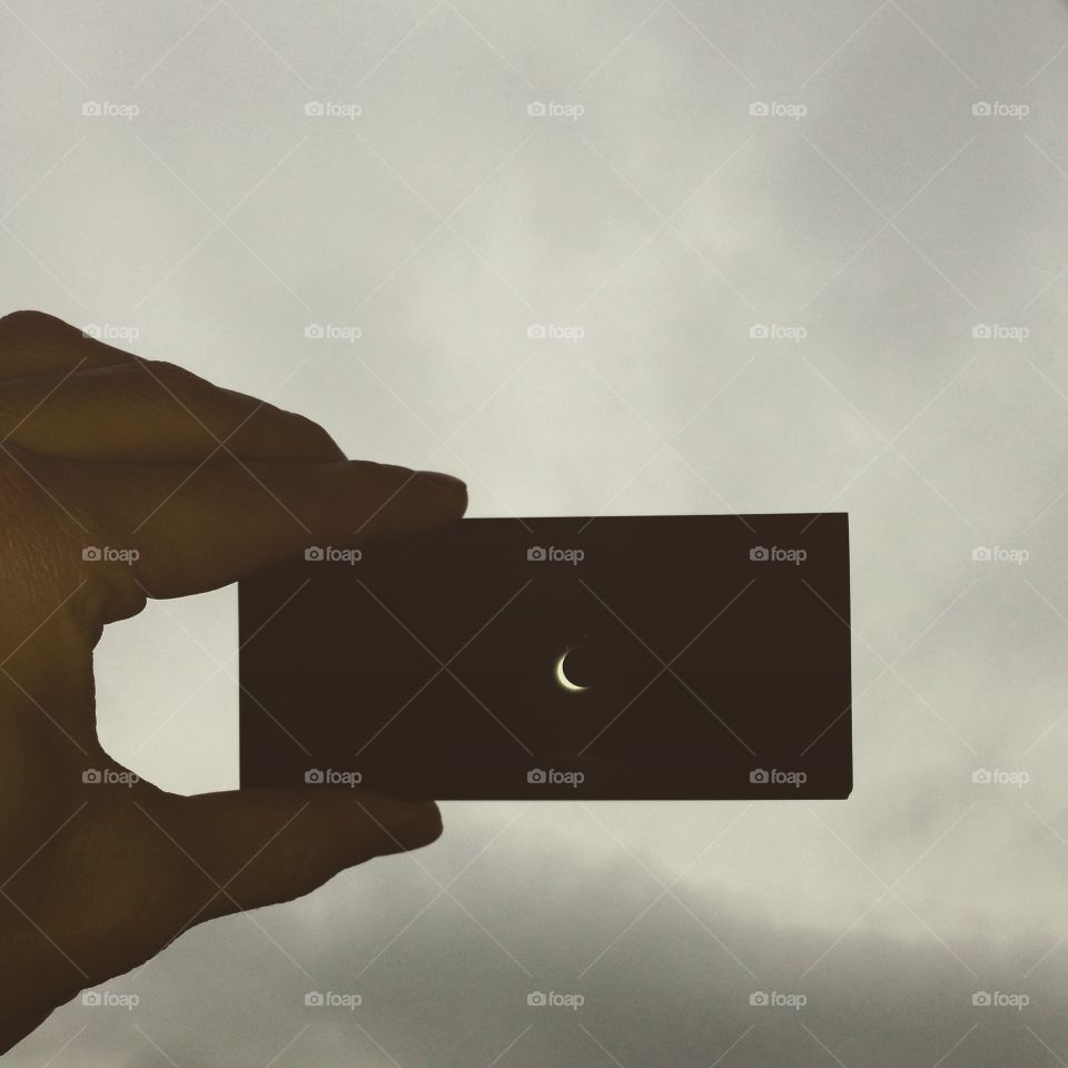 Solar eclipse . Watching the solar eclipse through a piece of glass.