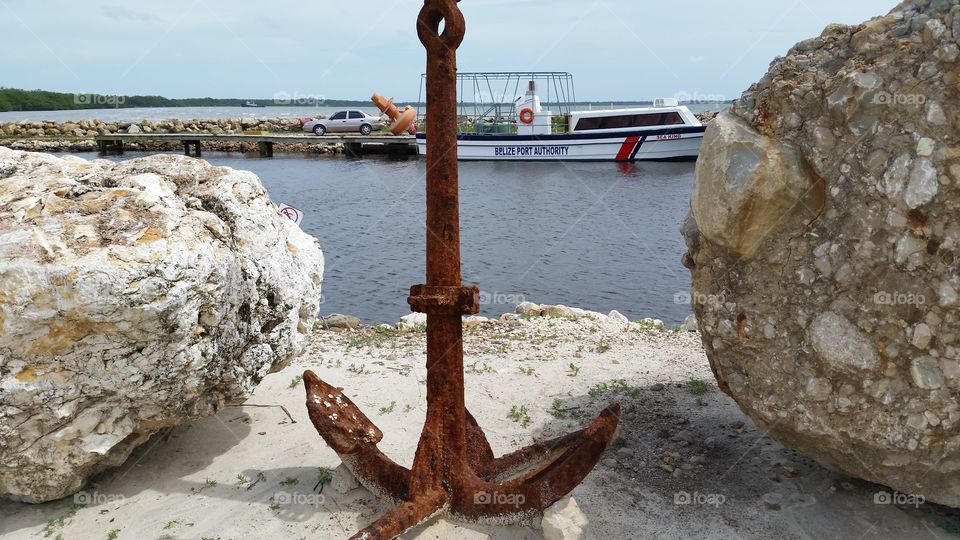 Rusty anchor port of belize. took this while relaxing g on a beach in belize.