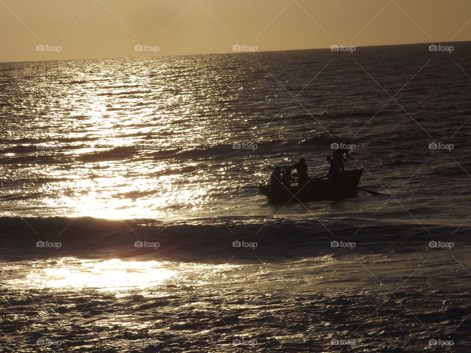 Locals go fishing on Macaneta island Mozambique at sunrise.